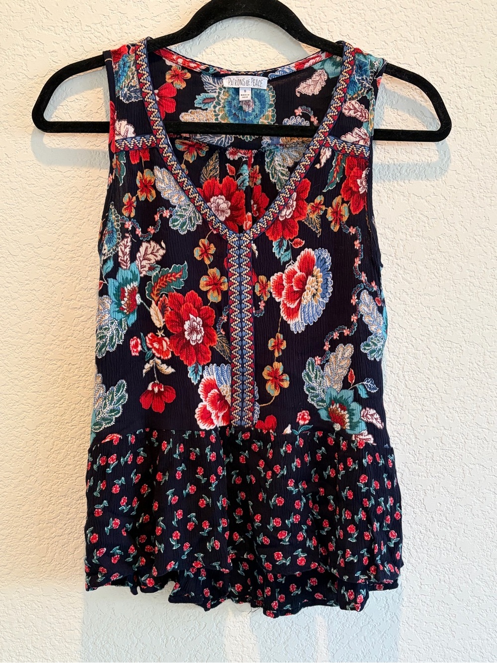 Patrons of Peace Navy Floral Sleeveless Peplum Tank Top